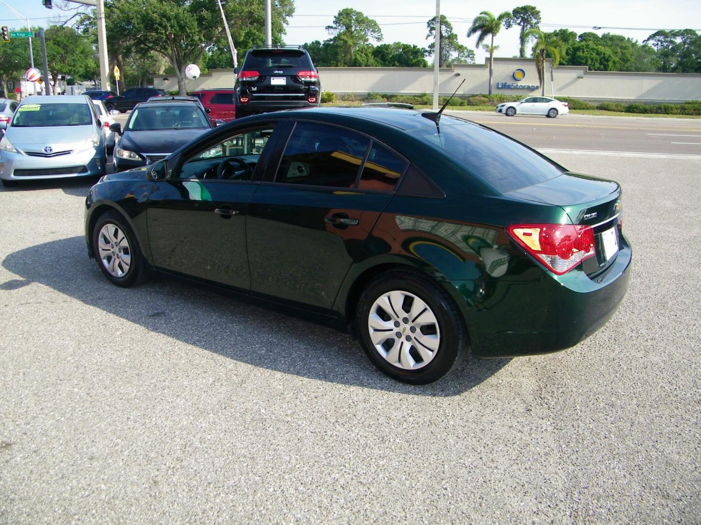 2014 GREEN /Beige Chevrolet Cruze LS (1G1PA5SH4E7) with an 1.8L L4 DOHC 16V FFV engine, 6-Speed Automatic transmission, located at 4000 Bee Ridge Road, Sarasota, FL, 34233, (941) 926-0300, 27.298664, -82.489151 - Photo#3